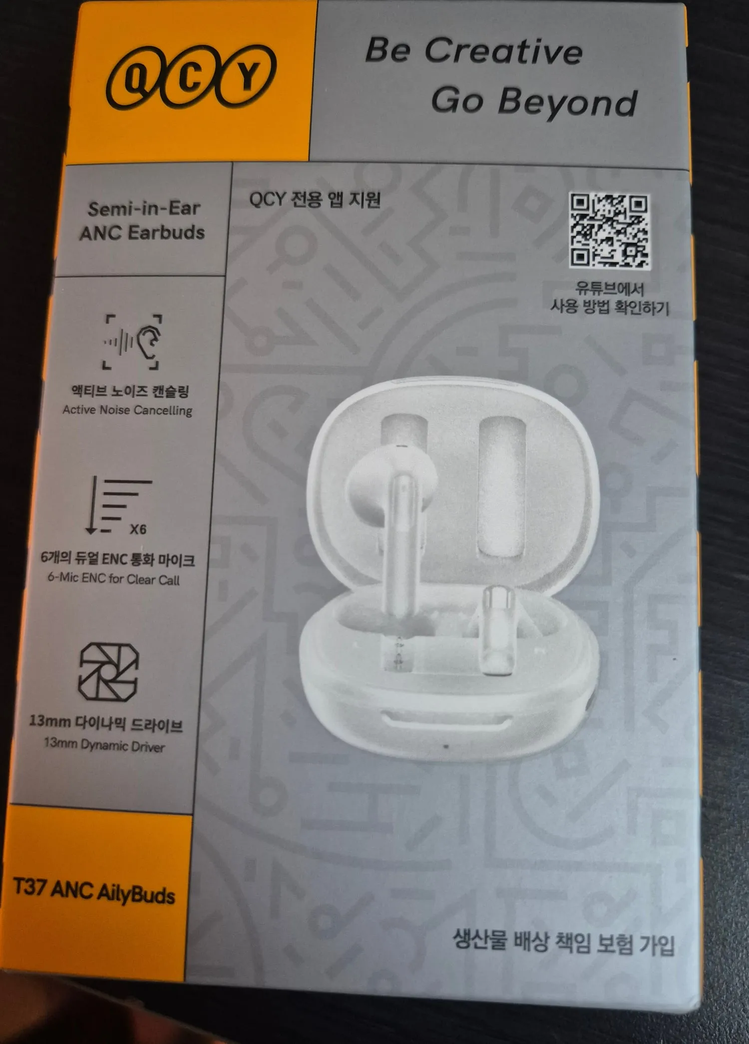 QCY T37 박스 앞면. Semi-in-Ear ANC Earbuds 표기와 기능 아이콘 세 개